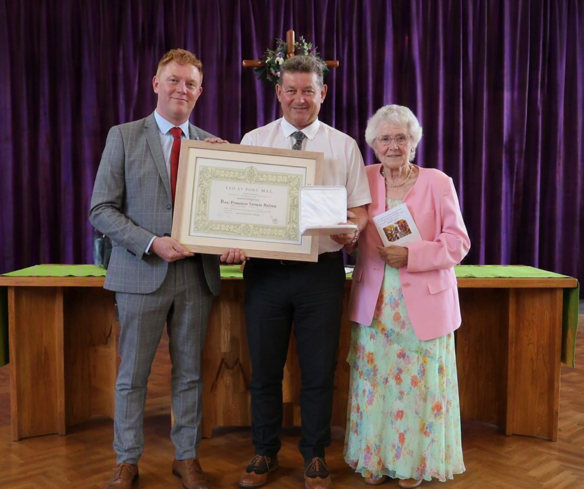 Xavier Bowers receiving the Benemerenti Medal for services to Catholic education